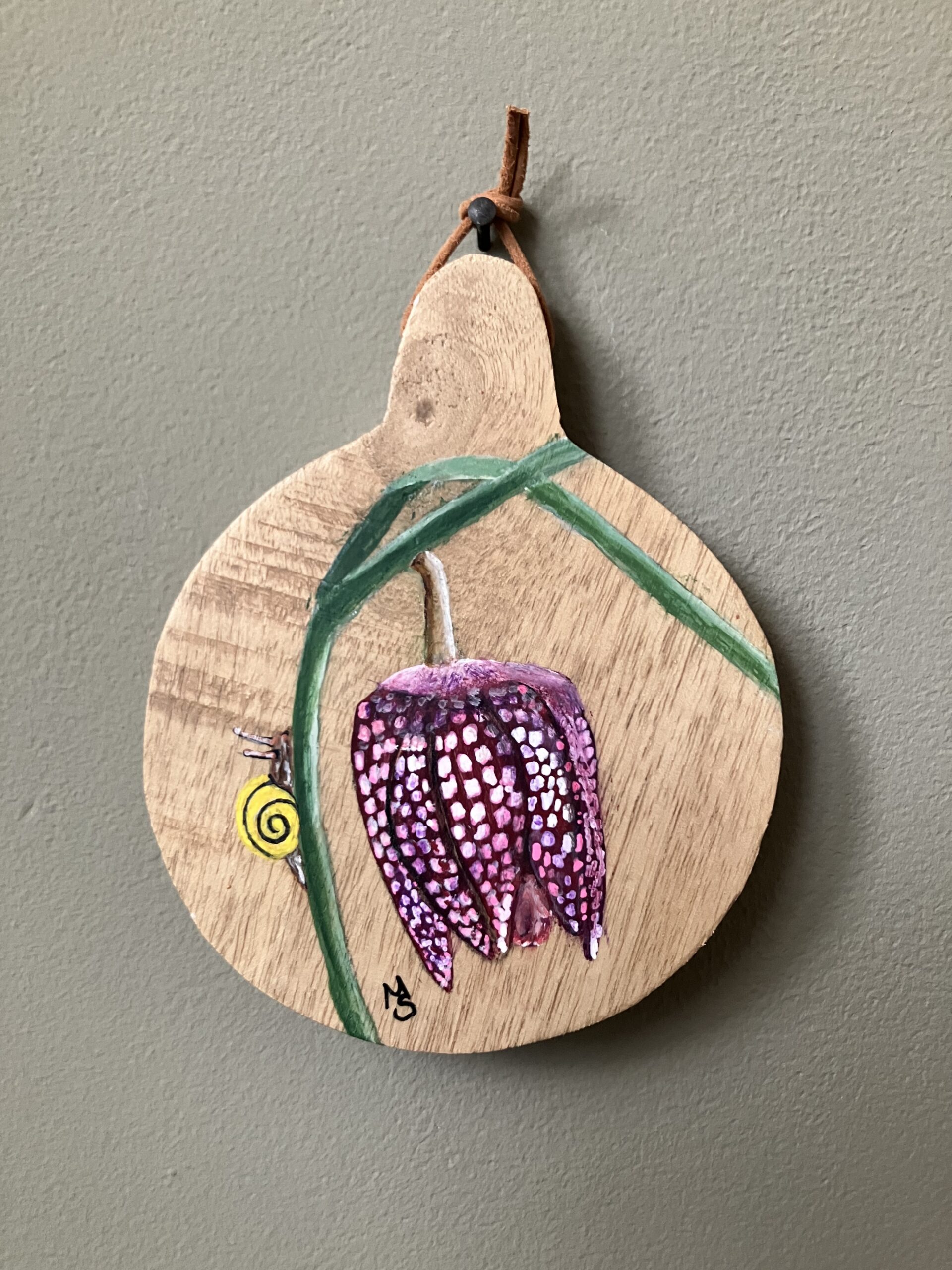 Mini schilderijtje Kievitsbloem (∅ 10 cm), ook te gebruiken als onderzetter. Prijs 14,95.